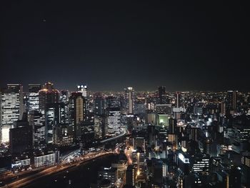 Illuminated cityscape at night