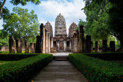 View of temple against building