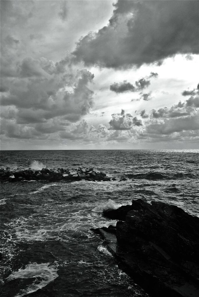 sea, horizon over water, water, sky, scenics, tranquil scene, beauty in nature, tranquility, cloud - sky, nature, beach, wave, cloudy, idyllic, shore, cloud, rock - object, seascape, rippled, outdoors