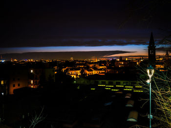 Illuminated cityscape at night