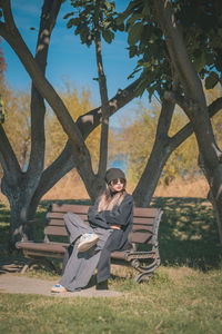 Woman sitting on field