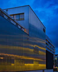 Low angle view of modern building against sky