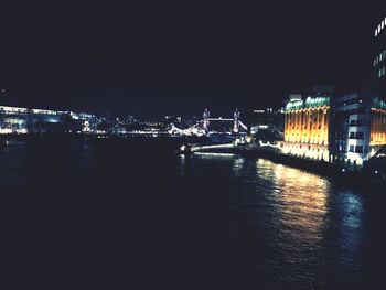 Reflection of illuminated buildings in water