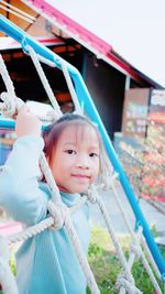 Portrait of happy girl in playground