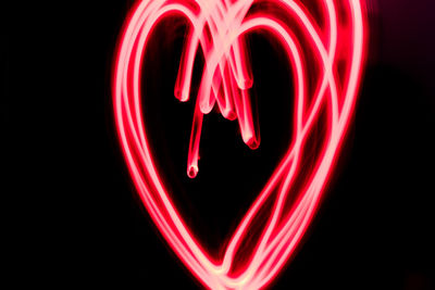 Close-up of heart shape against black background