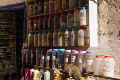 Various bottles in shelf at store