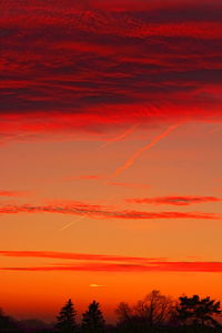 Low angle view of dramatic sky during sunset