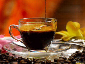 Close-up of coffee cup on table