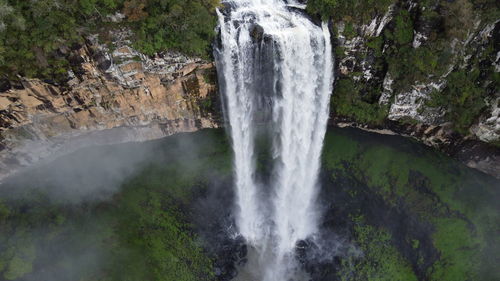 Water flowing through rocks in forest
