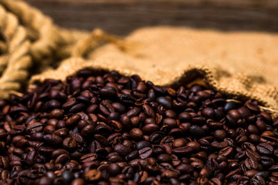Close-up of coffee beans on table