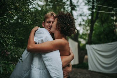 Young couple standing outdoors