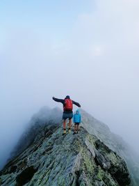 Man on rock in mountains