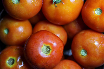Full frame shot of oranges in market