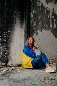Girl holding the flag of ukraine