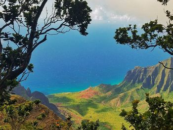 Scenic view of tree mountains against sky