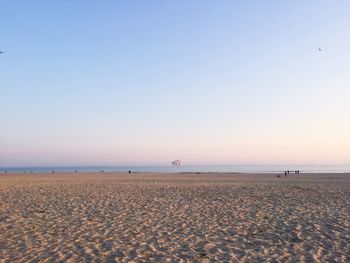 Scenic view of beach against clear sky