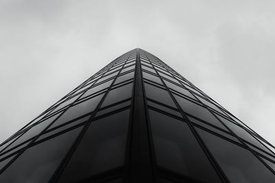 Low angle view of modern built structure against sky