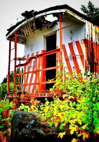 Low angle view of abandoned house