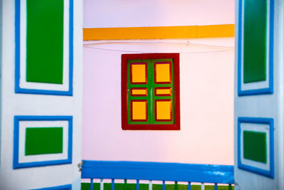 Colorful doors and windows in salento a small town located at the quindio region in colombia