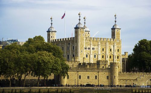 View of historical building against cloudy sky