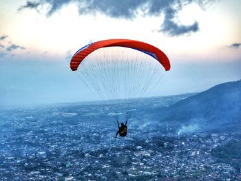 Parachute flying over mountain