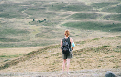 Back traveler woman with medical face mask