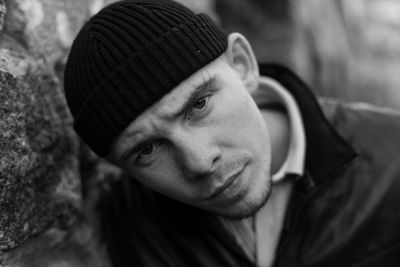 Portrait of young man wearing hat