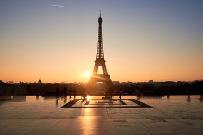 Low angle view of eiffel tower at sunset