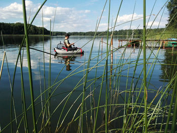 Man boating on lake