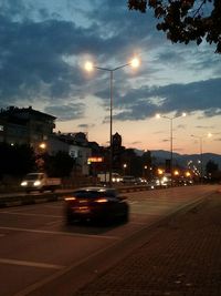 Cars on road at night