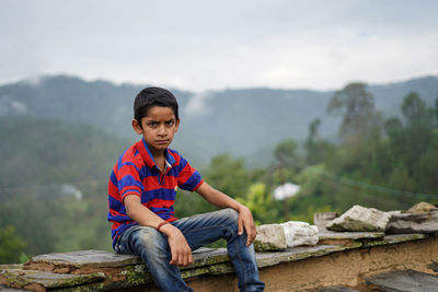 Portrait of a indian pahadi kid who belongs to the mountains.