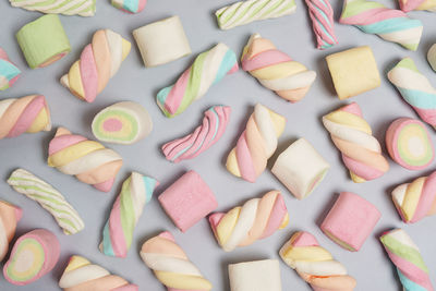 Multi-colored marshmallows. background or texture of colorful blue and pink marshmallows.