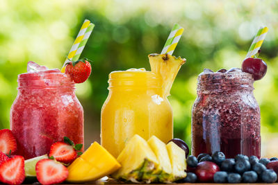 Close-up of fruits on glass