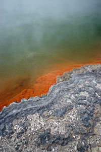 High angle view of smoke emitting from hot spring