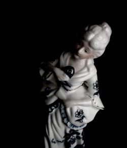 Close-up view of art over black background