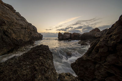 Scenic view of sea against sky during sunset