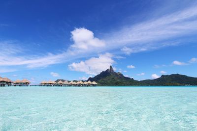 Scenic view of sea against cloudy sky