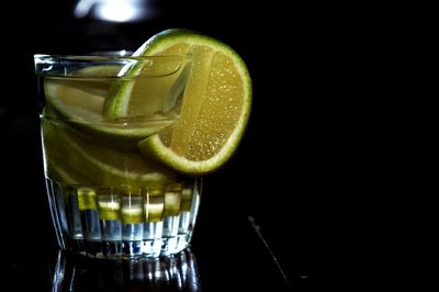 Close-up of drink against black background