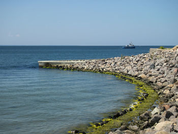 Scenic view of sea against clear sky