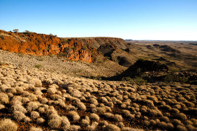 Rock formations in desert against sky