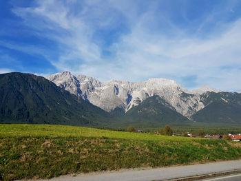 Scenic view of snowcapped mountains against sky