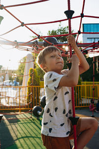 Portrait of smiling young woman standing in gym