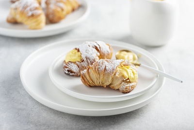 Close-up of breakfast served in plate on table