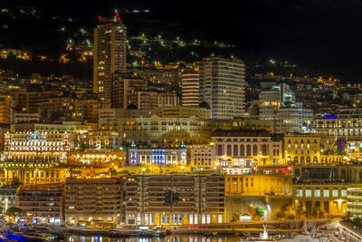 Illuminated city lit up at night