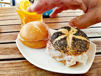 Close-up of hand holding ice cream
