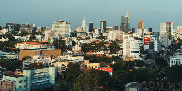 Buildings in city against sky