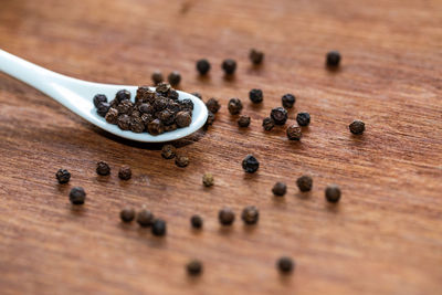 High angle view of roasted coffee beans on table