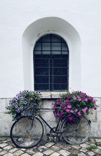 Bicycle parked against wall