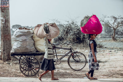 People standing on bicycle