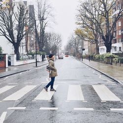 People walking on road in city